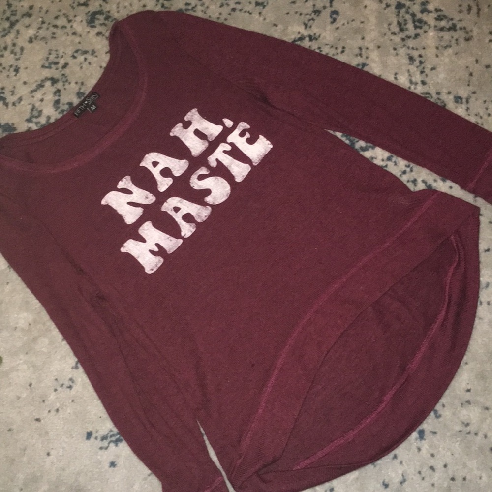 Maroon sweater.
